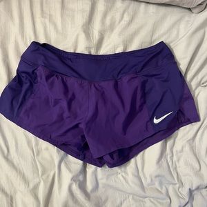 Purple Nike athletic shorts